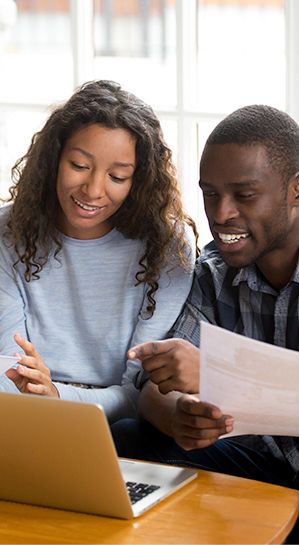 Image of a couple looking at a computer