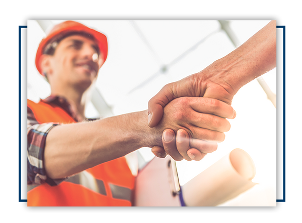 construction workers shaking hands