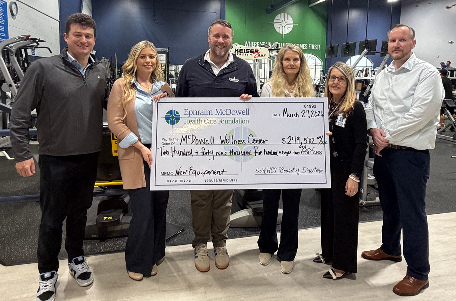 Foundation check presentation to McDowell Wellness Center.jpg