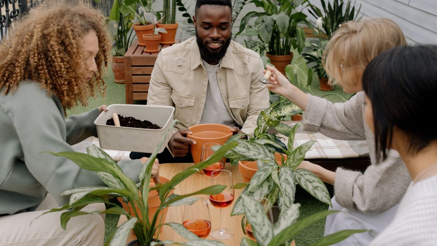 people potting plants