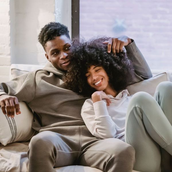 boyfriend and girlfriend sitting together