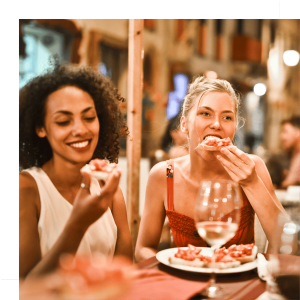 two friends at dinner together