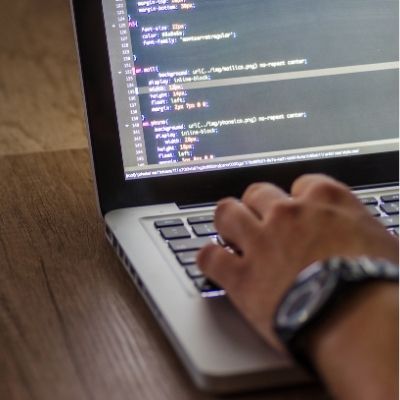 typing code on laptop typing code on laptop