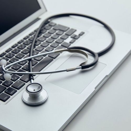 computer and a stethoscope