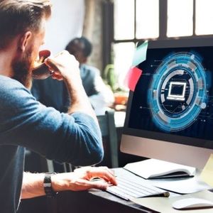 tech professional working on computer