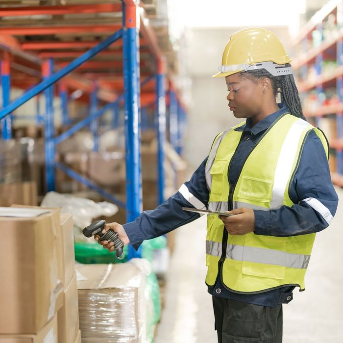 warehouse employee scanning items