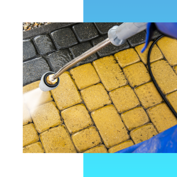 Pressure washing stones in the backyard