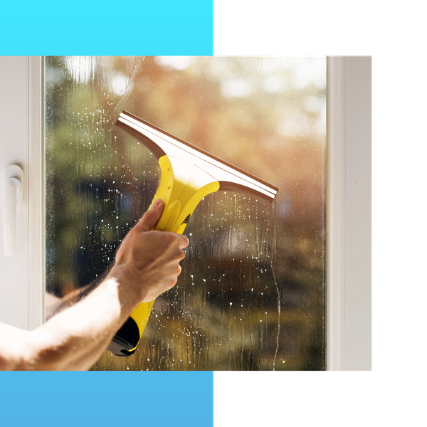 Cleaning a window with a wiper blade