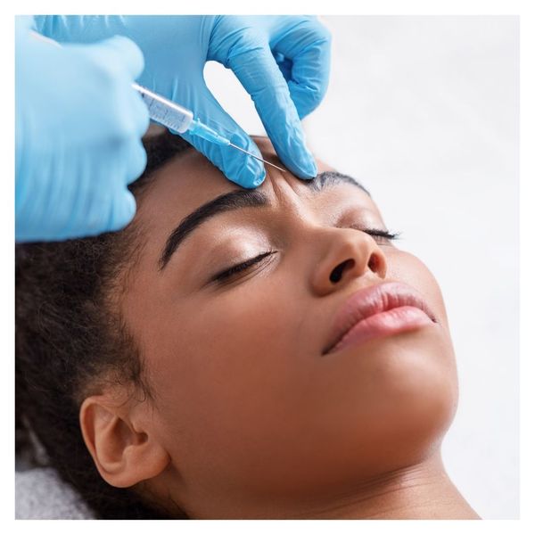 woman getting botox in forehead