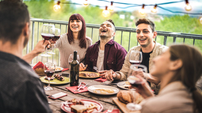 happy group of people eating together