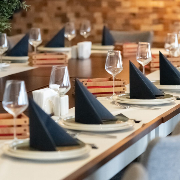 a long table set for dining