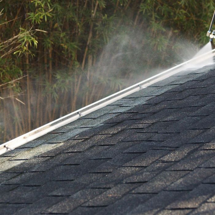 roof being cleaned