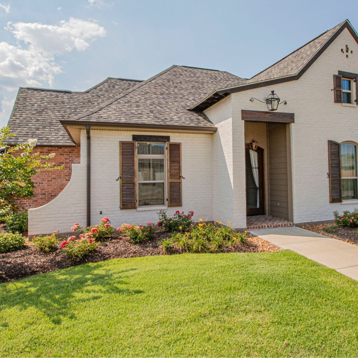 residential home with beautiful landscaping