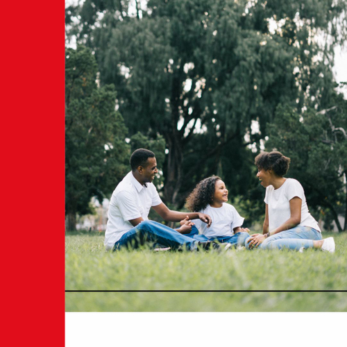 Family sitting on a lawn