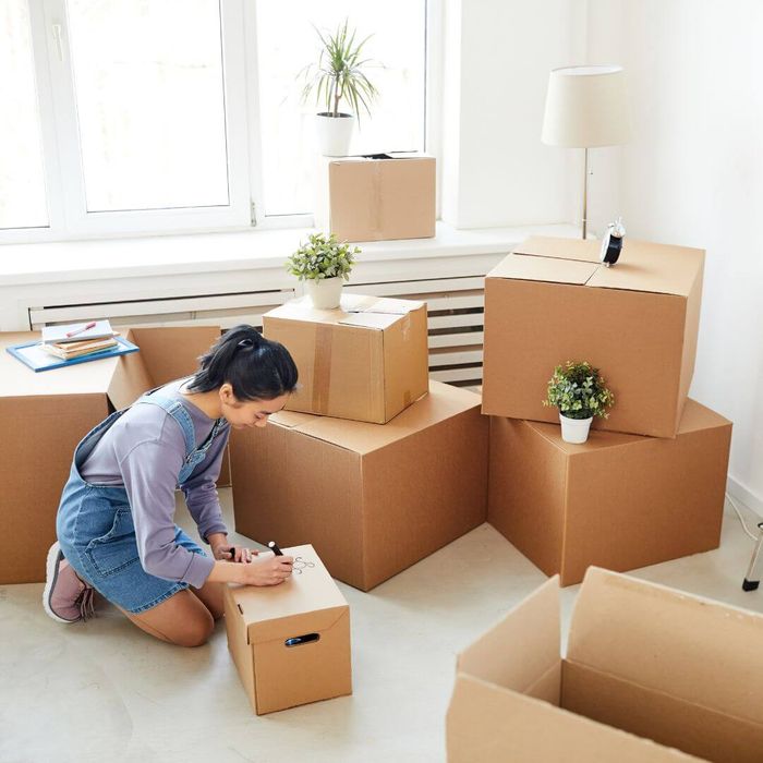 woman packing boxes