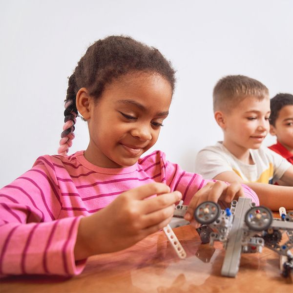 girl learning hands on