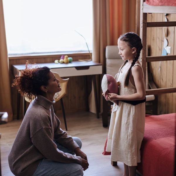 Mother talking to child