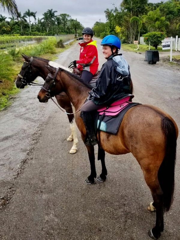 2 people on horseback