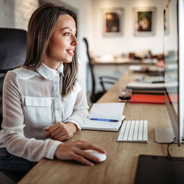 woman looking at computer