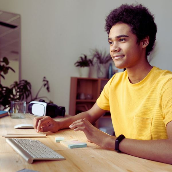 young man looking at computer