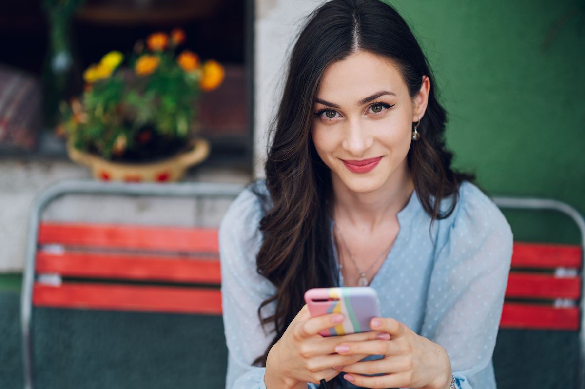 portrait-of-a-beautiful-woman-sitting-in-a-street-2023-03-31-17-16-01-utc.jpg
