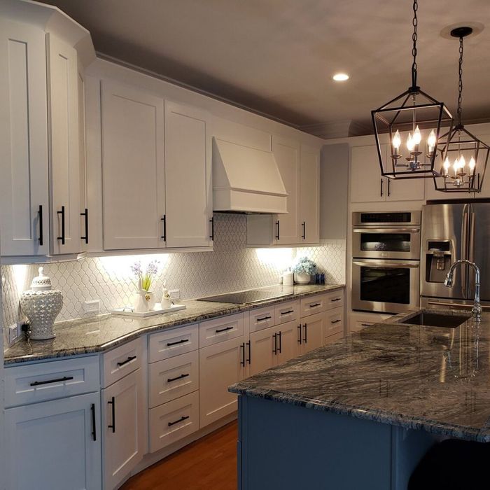 a white and grey kitchen remodel by Aikey