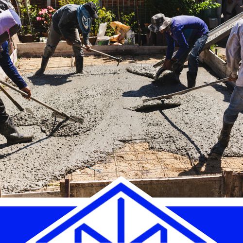 Workers pouring concrete