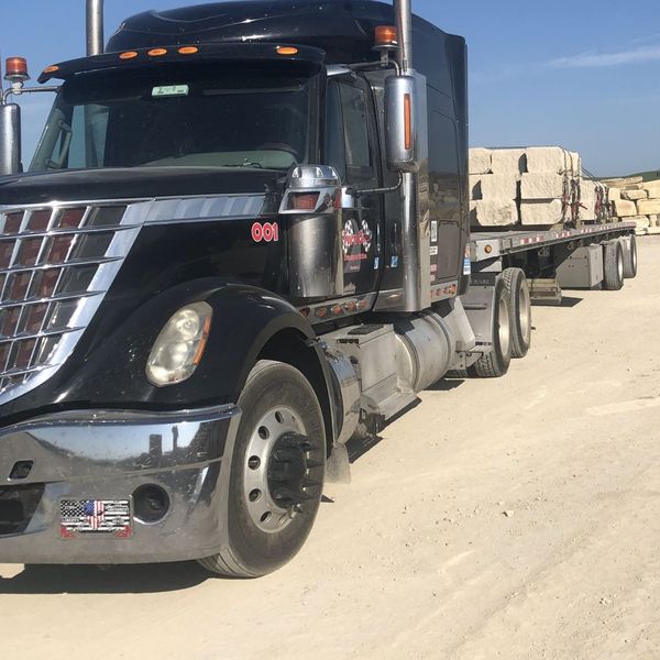 truck hauling stone