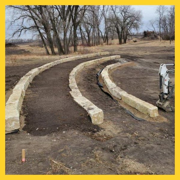 stone retaining walls being constructed