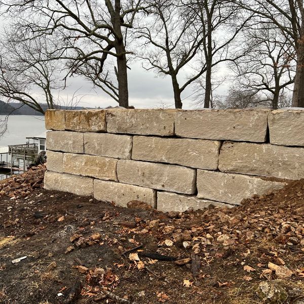 Limestone retaining wall.