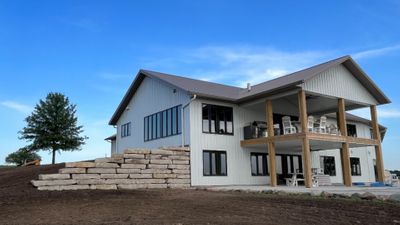 Home with a retaining wall.