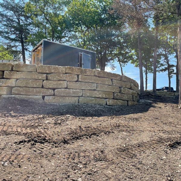 Limestone retaining wall.