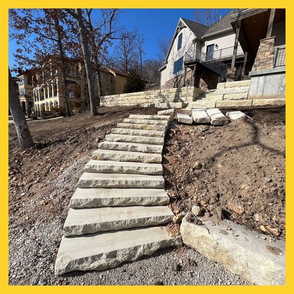 stone slab stairs, landscaping in progress