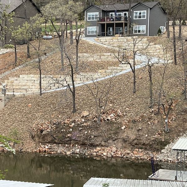 home with a retaining wall