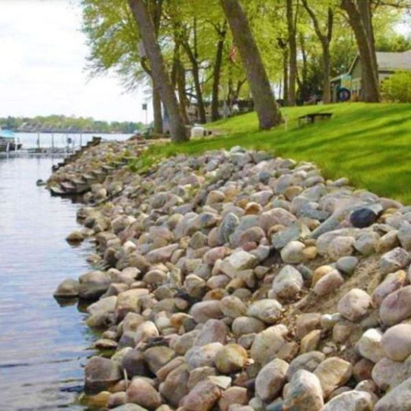 river rock lawn barrier