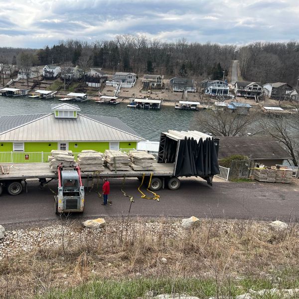 Limestone being delivered to lakeside homes.