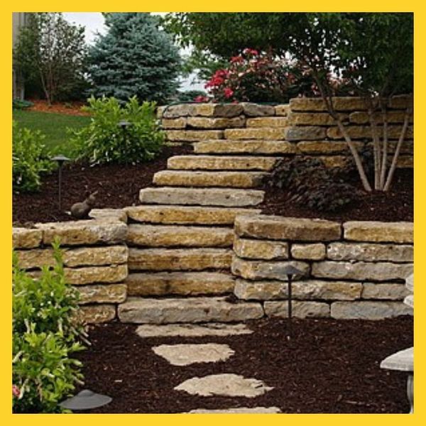 stone retaining walls and stairs in garden