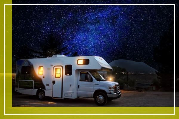 RV with lights on at night