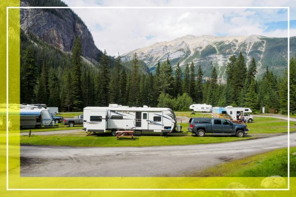people at a campsite with their RV