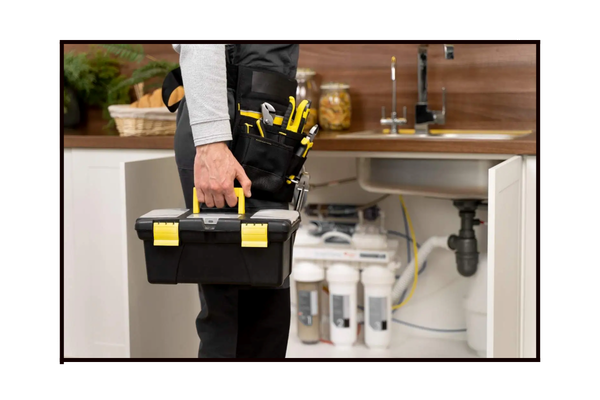 plumber with toolbox