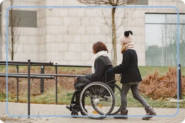 woman being pushed in wheelchair woman being pushed in wheelchair