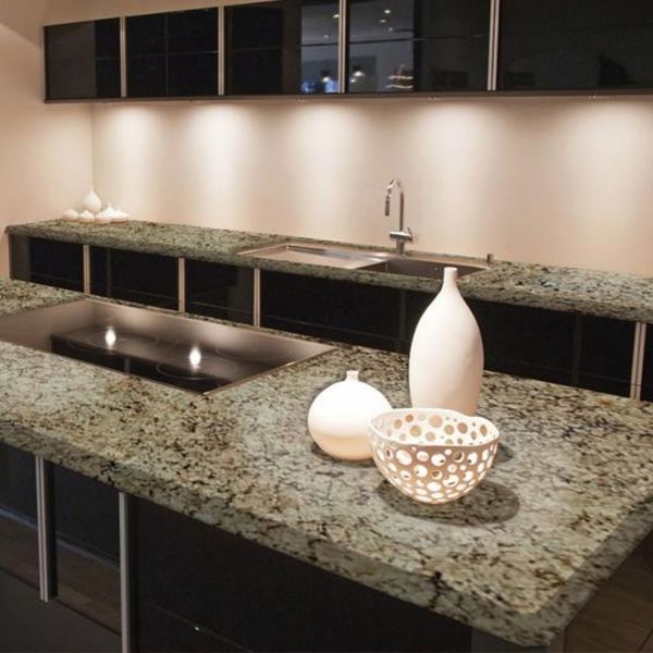 black cabinets with speckled granite countertops