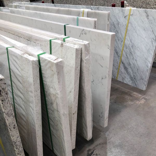 Large kitchen countertop slabs of quartz in warehouse
