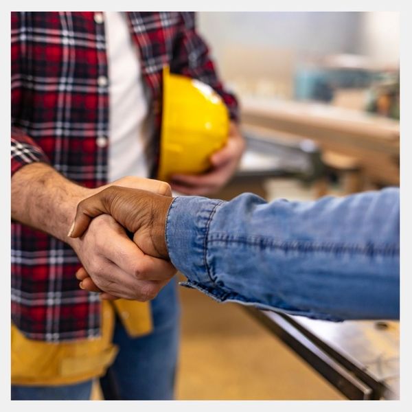 A contractor shaking hands 