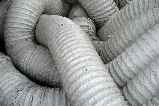 A close-up of a group of air ducts