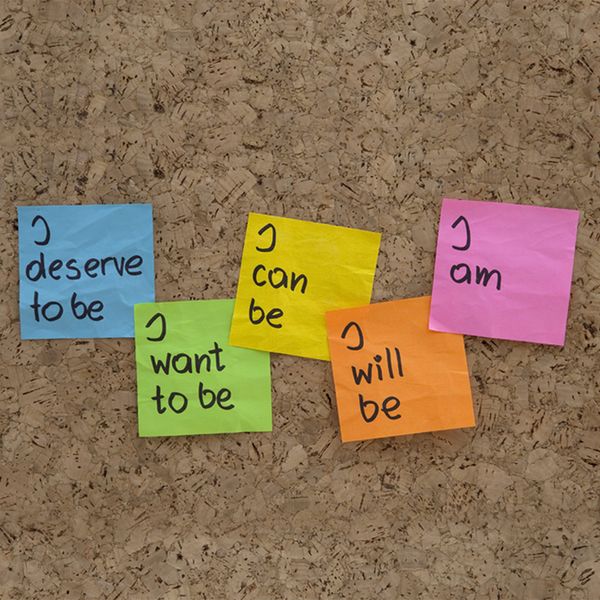 image of post-it notes on a bulletin board with positive affirmations