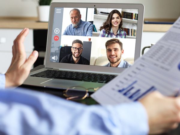 image of a person on a video conference call with four people