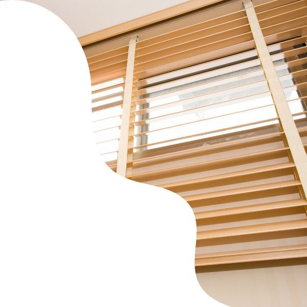 cream colored wood blinds