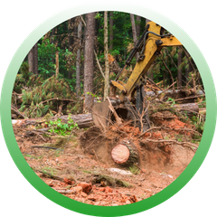 Circular icon of a yellow excavator claw clearing debris and small logs from a dirt forest floor.