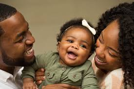 Warm mom dad and baby.jpg